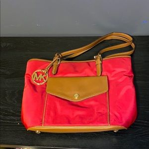 Reddish/pink Michael Kors purse